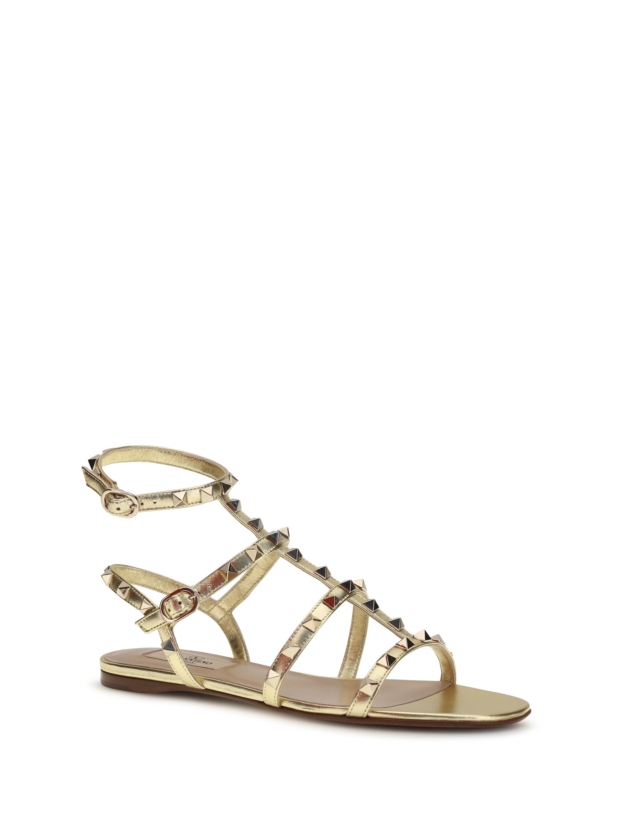 rockstud flat sandals laminated leather