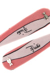 the pucci hair clip set is distinguished by a snap construction covered in lycra
