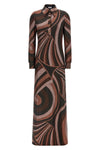 the long pucci dress defines a tight silhouette through a sophisticated processi