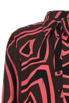 the pucci shirt stands out for its fluid and impeccable sartorial construction