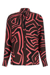 the pucci shirt stands out for its fluid and impeccable sartorial construction