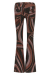 the pucci trousers define a tight silhouette that opens into an elegant flared b
