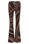 the pucci trousers define a tight silhouette that opens into an elegant flared b