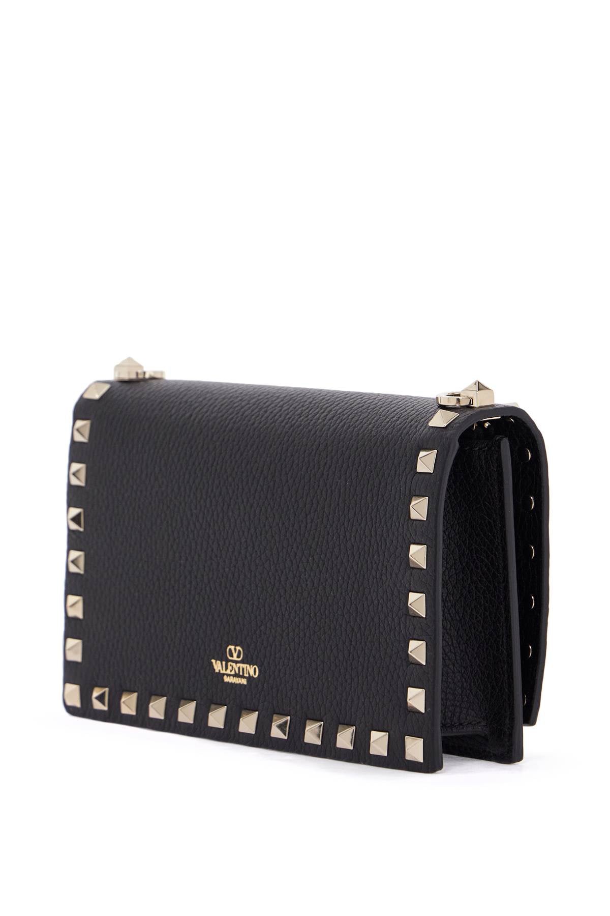 mini black leather bag with golden metal studs