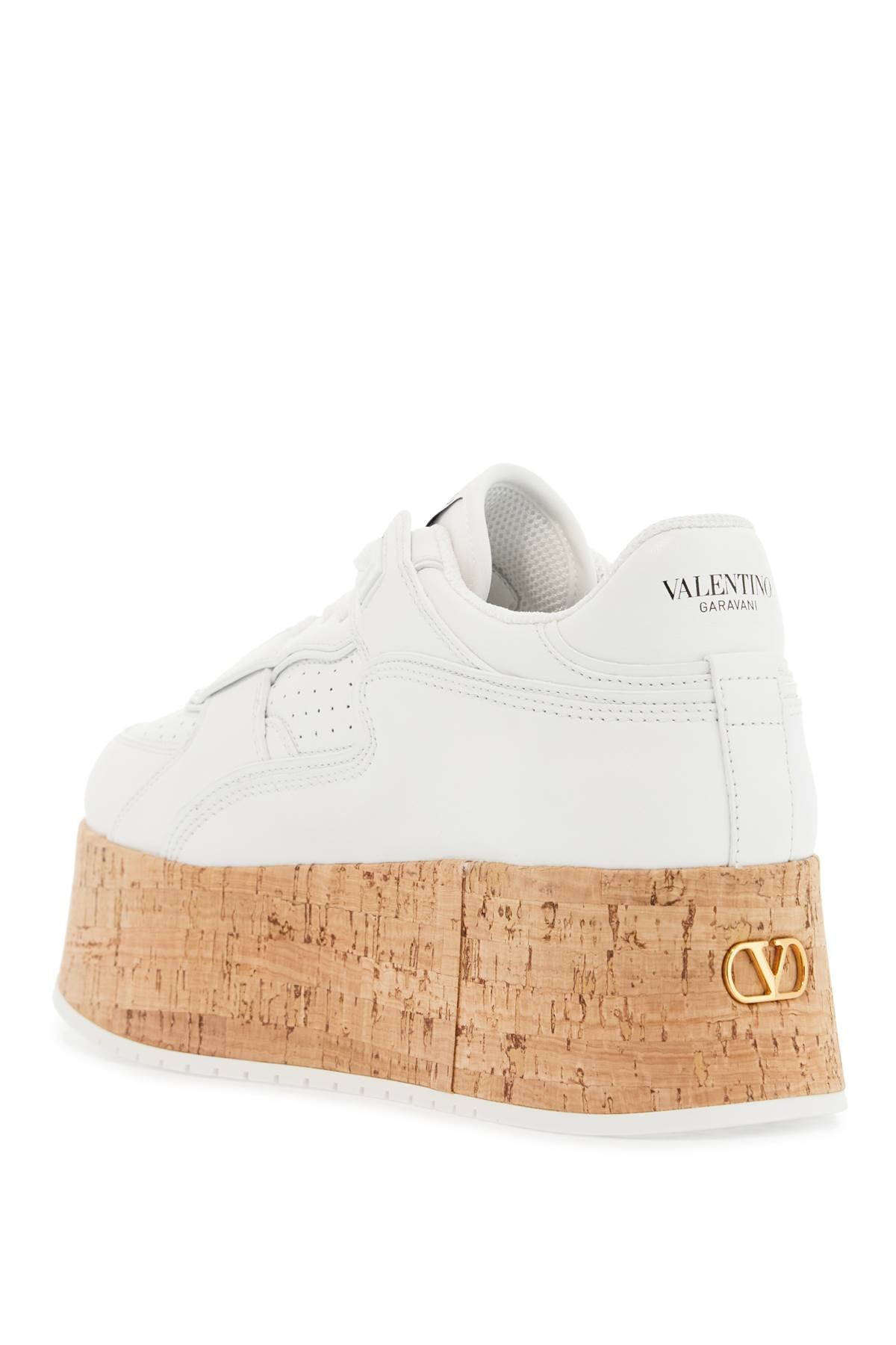 sneaker with cork sole and white leather perforated details