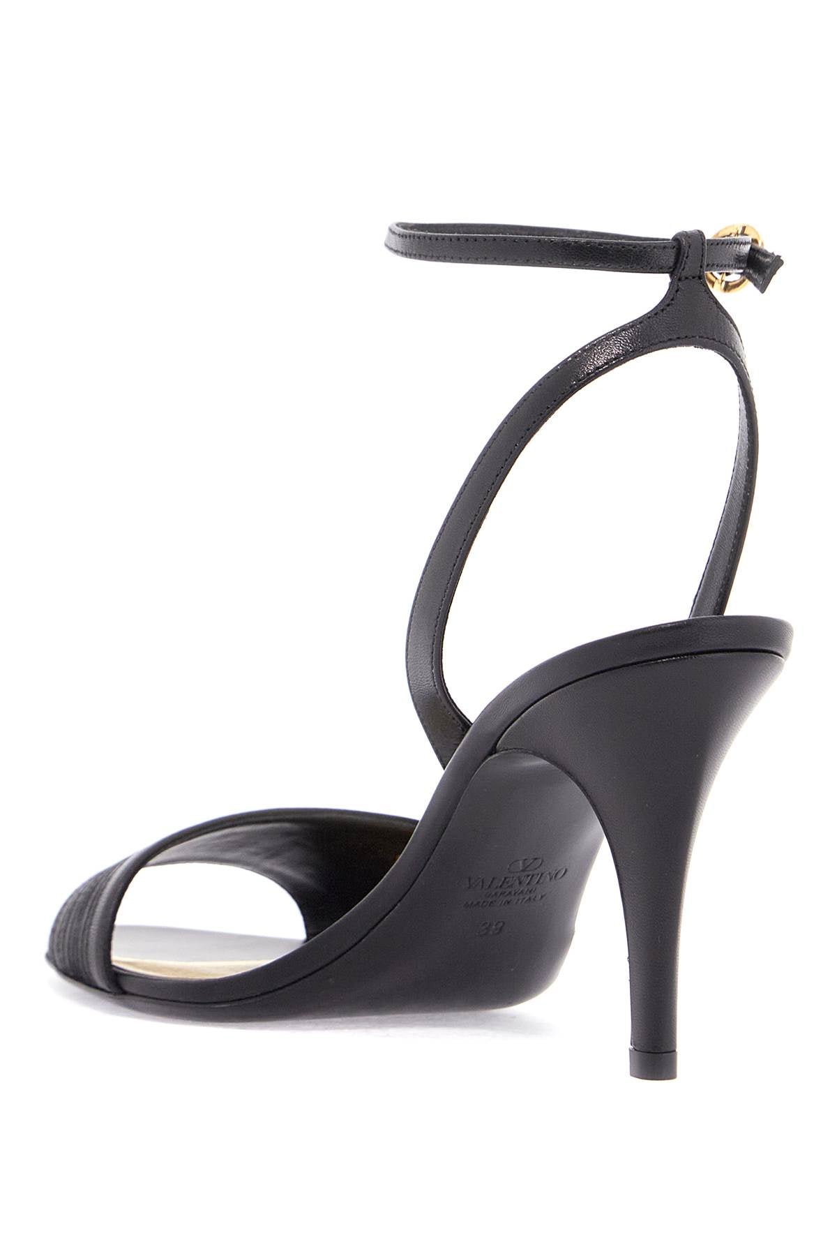 black goat leather sandals with gold buckle and stiletto heel