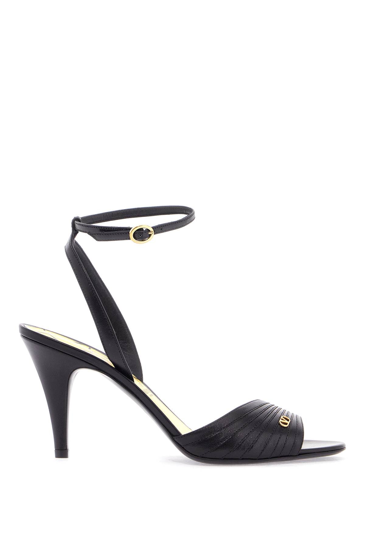 black goat leather sandals with gold buckle and stiletto heel