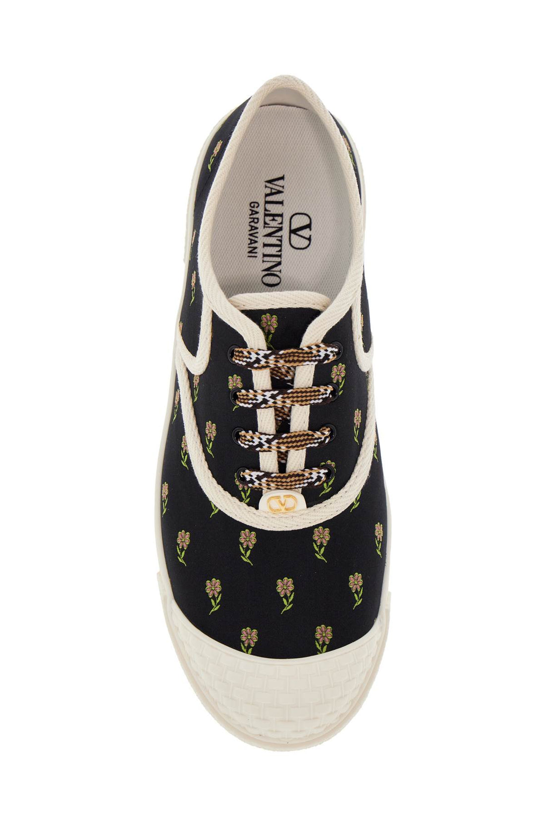 black cotton sneakers with floral pattern and rubber sole