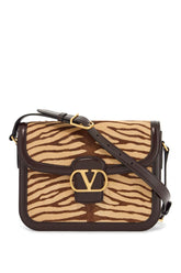 beige and dark brown striped leather shoulder bag