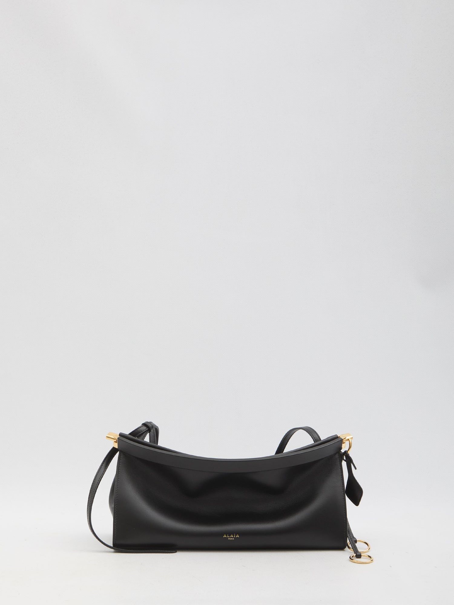 ALAIA OS medium le click east west black bag