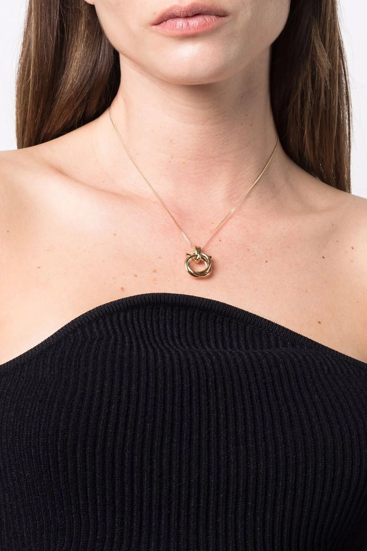 the ferragamo gancini torchon necklace redefines the visual codes of the maiso