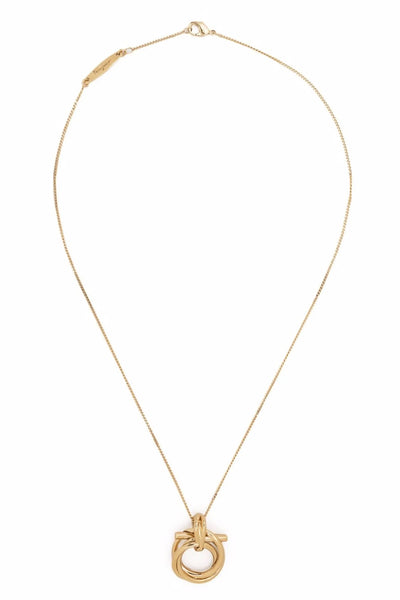 the ferragamo gancini torchon necklace redefines the visual codes of the maiso
