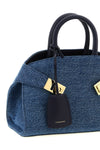the ferragamo hug (xs) handbag defines a new geometry through a structured sil