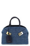 the ferragamo hug (xs) handbag defines a new geometry through a structured sil