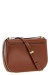 the ferragamo double gancini crossbody bag is made of pure smooth and shiny calf