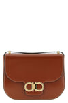 the ferragamo double gancini crossbody bag is made of pure smooth and shiny calf