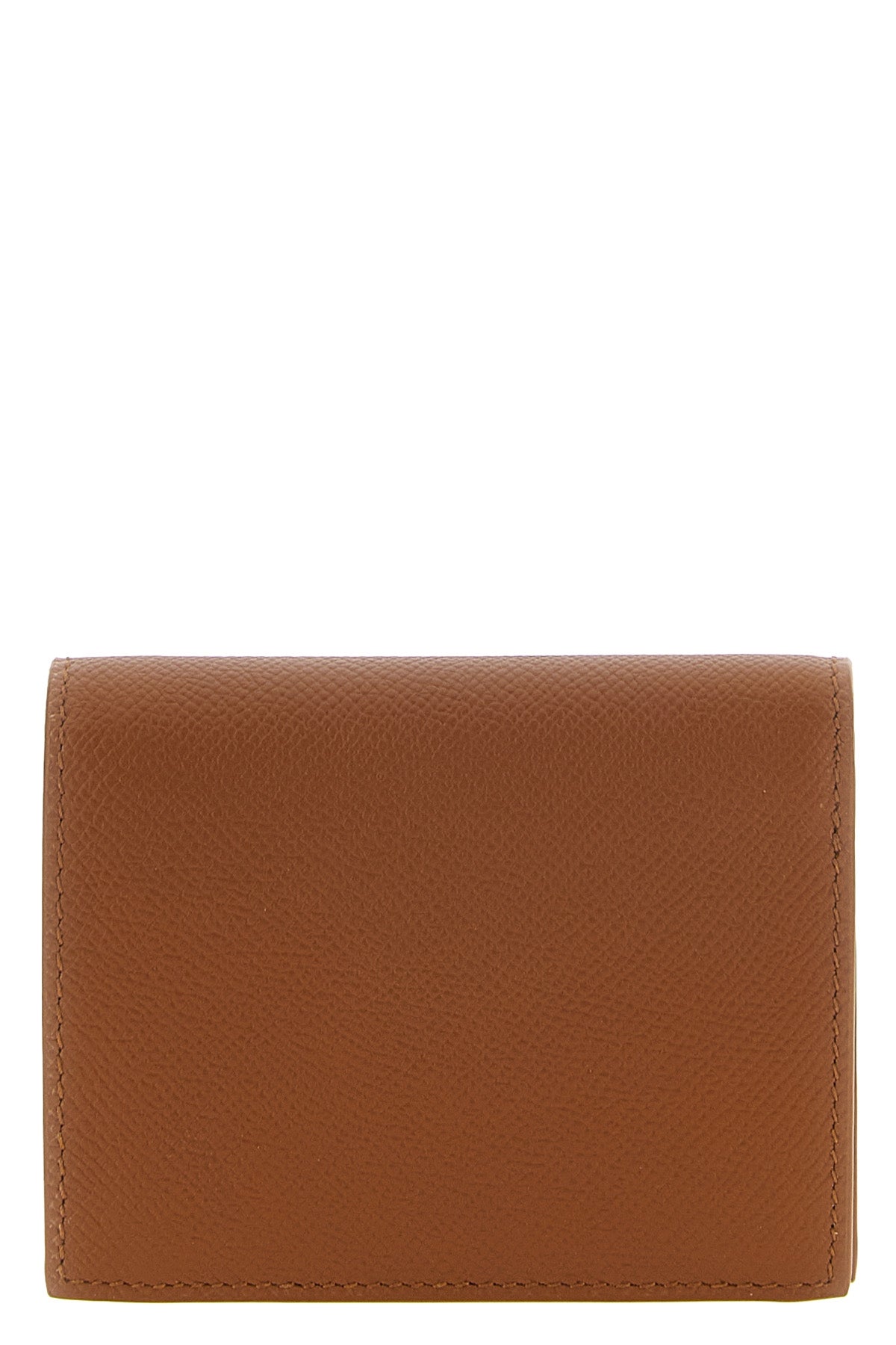 the compact ferragamo wallet is made of pure hammered calf leather in a versatil