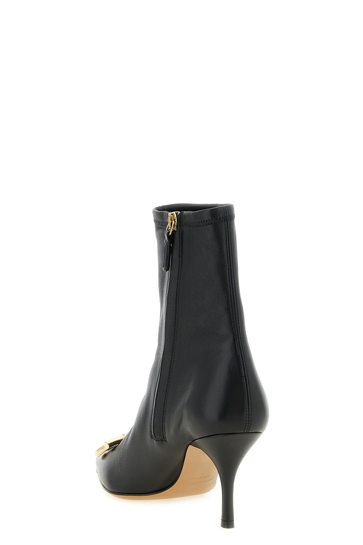 ferragamo mariu ankle boots have a tapered silhouette defined by a geometric t