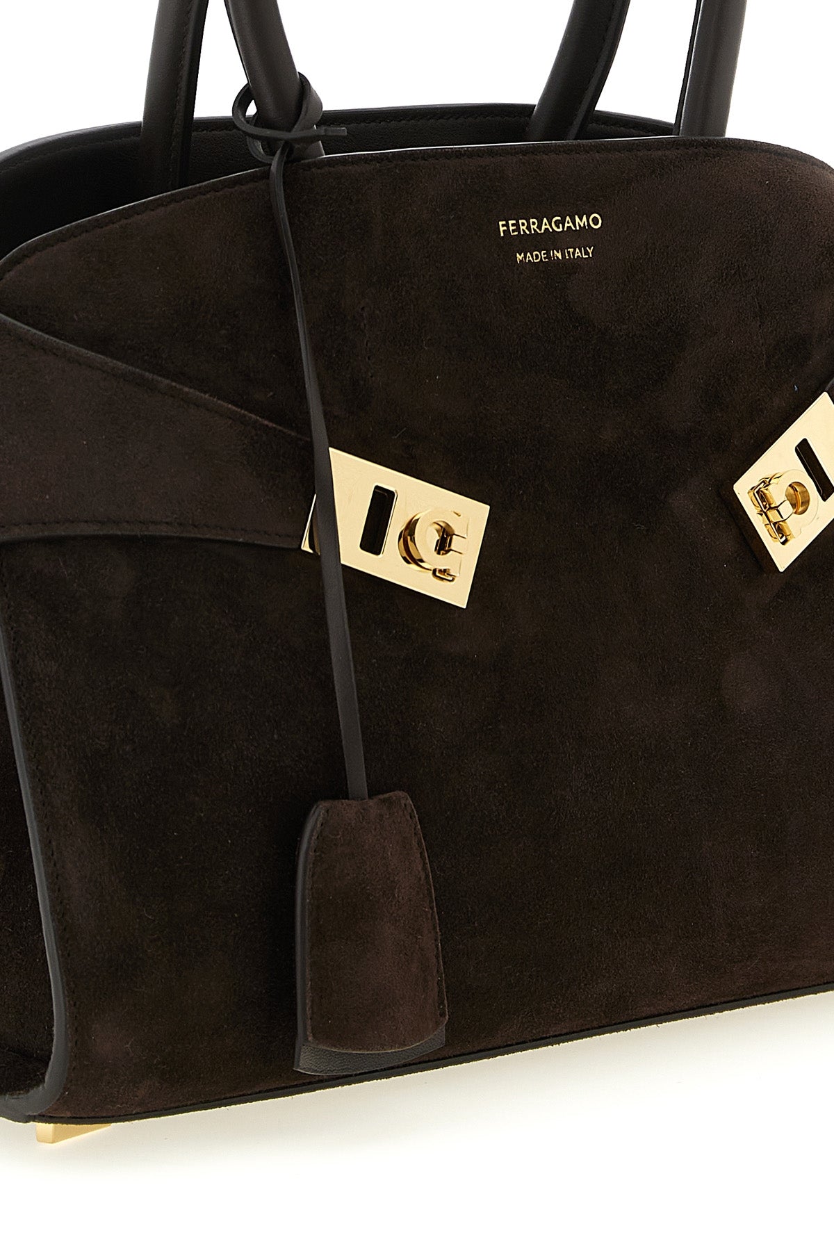 the ferragamo hug th (s) handbag sets new standards in sartorial architecture