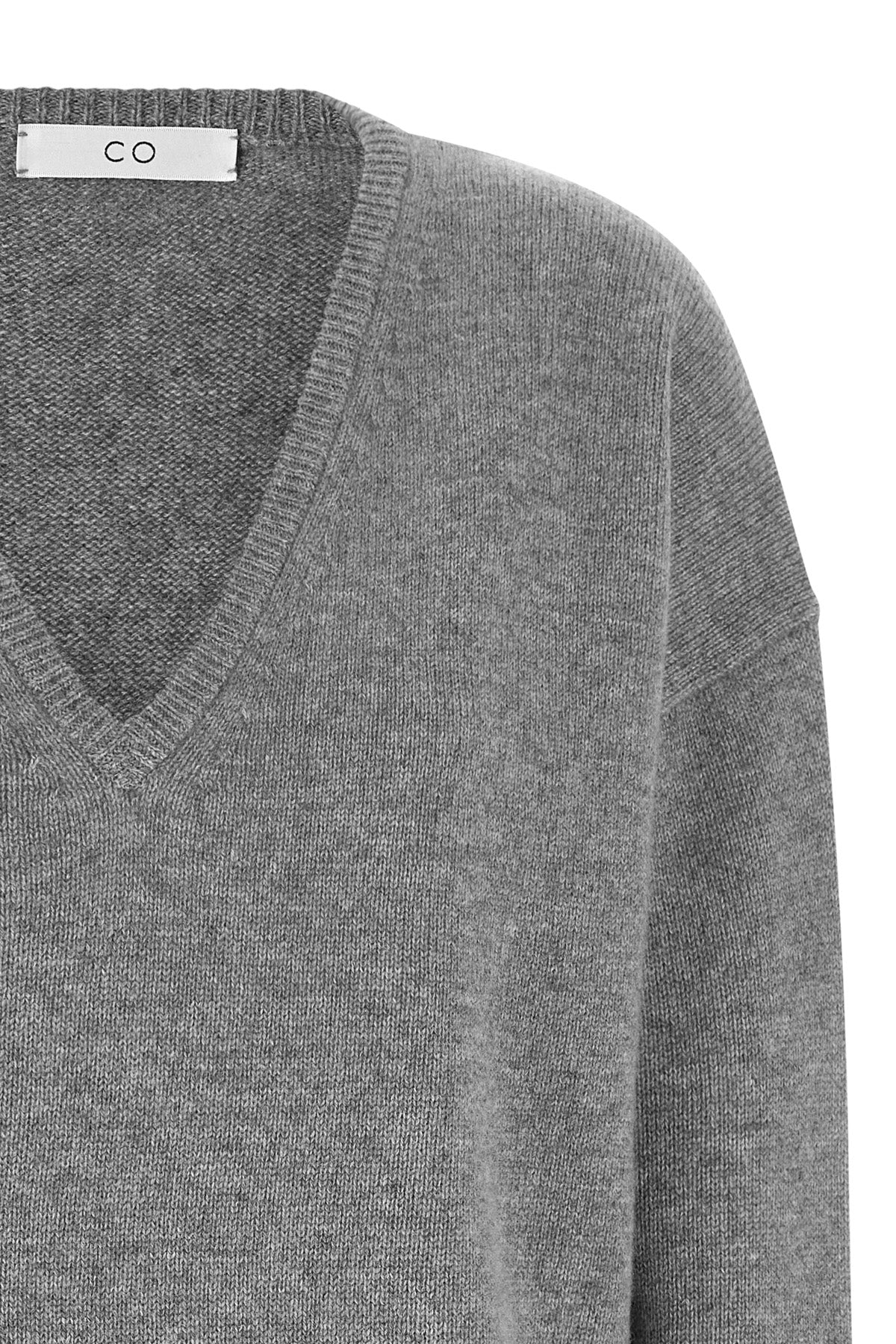 the v-neck co sweater redefines the concept of essential knitwear through a rela