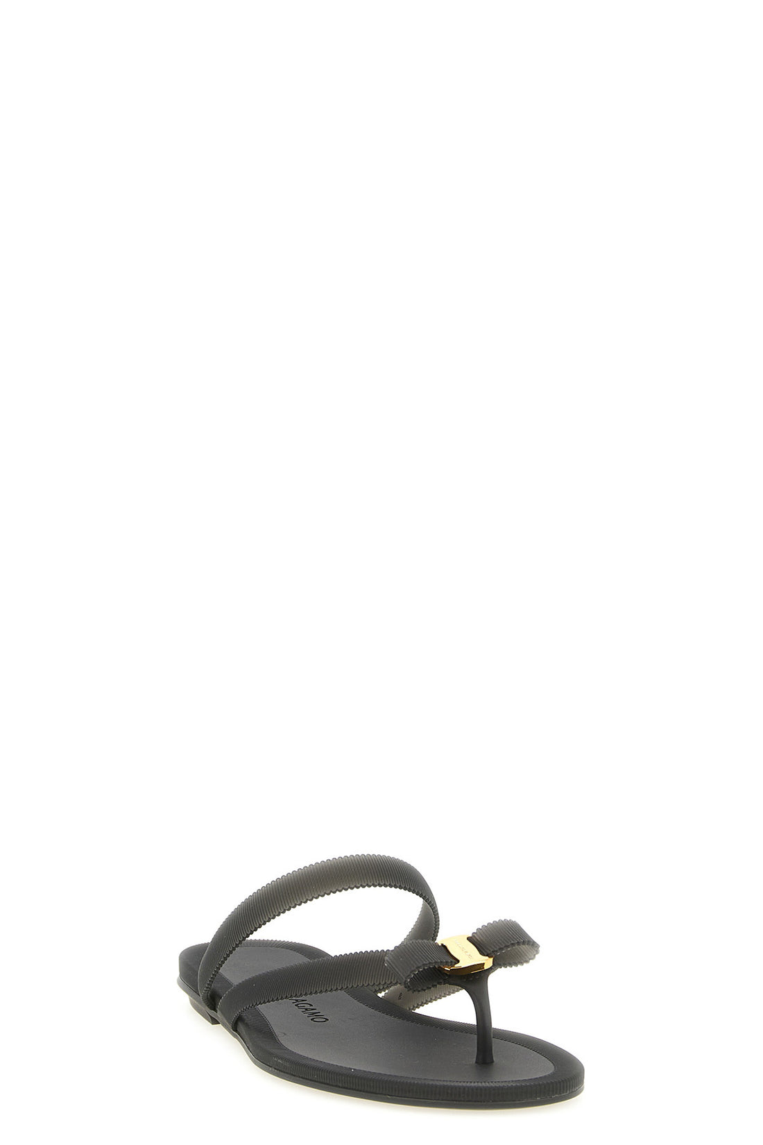 FERRAGAMO 5 the ferragamo jealsa thong sandal features a flat slip-on silhouette made of a
