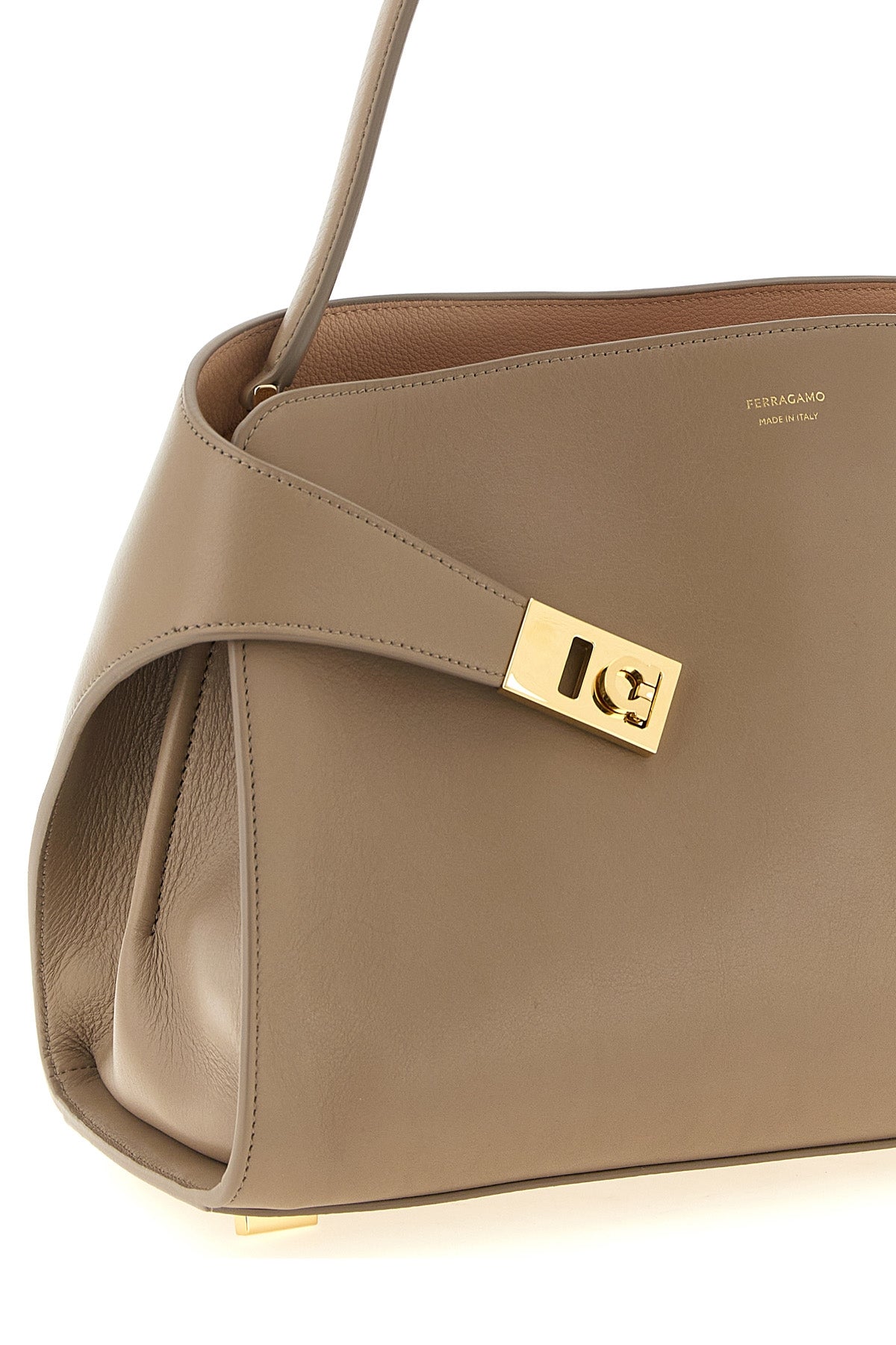 the ferragamo hug soft (m) shoulder bag redefines everyday elegance through a