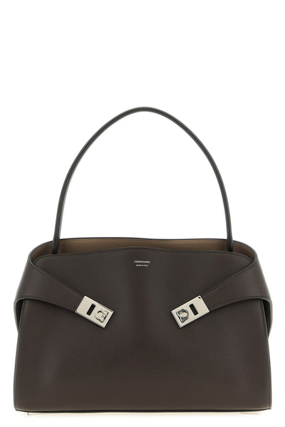 the ferragamo hug soft (m) shoulder bag stands out for its soft and enveloping