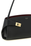 the ferragamo hug east-west shoulder bag redefines contemporary elegance throu