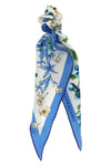 the ferragamo lozenge scarf redefines everyday elegance through an asymmetrical