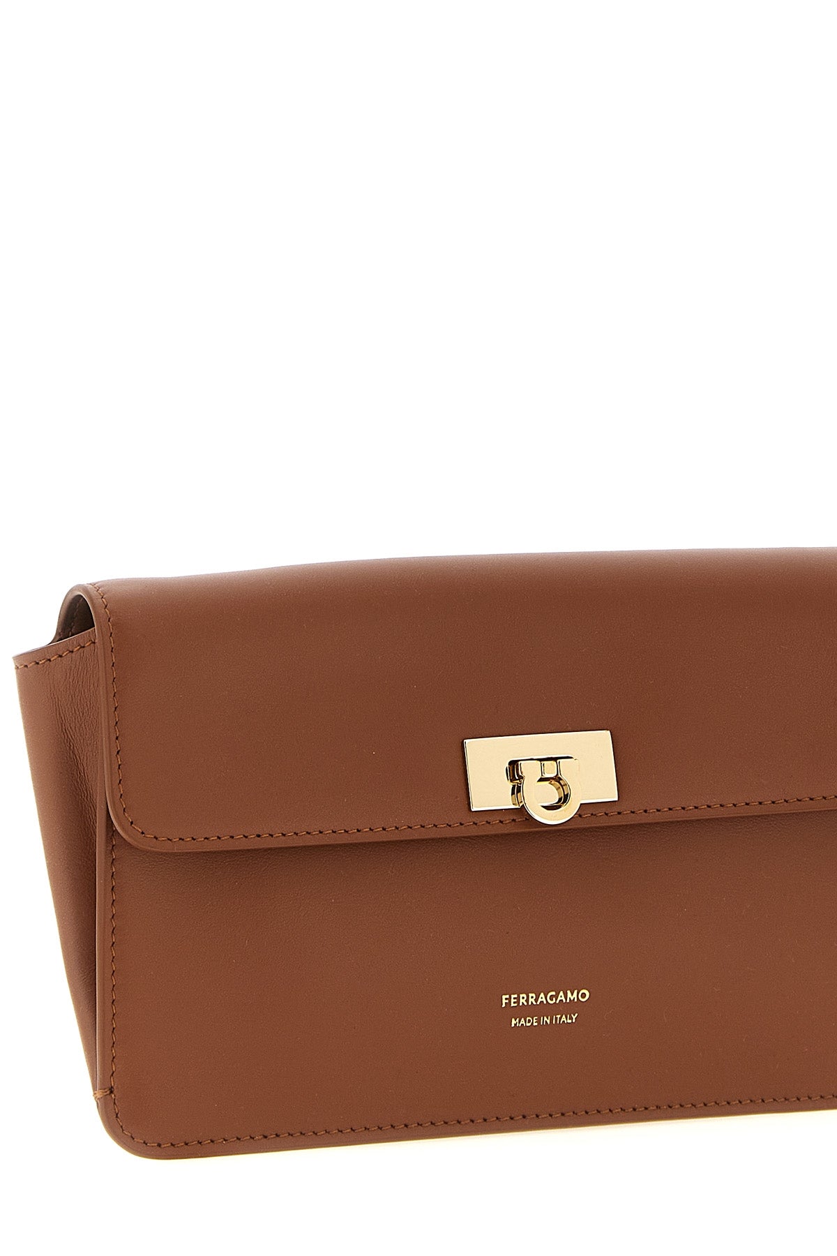 the ferragamo harley clutch defines structural precision through a rectangular