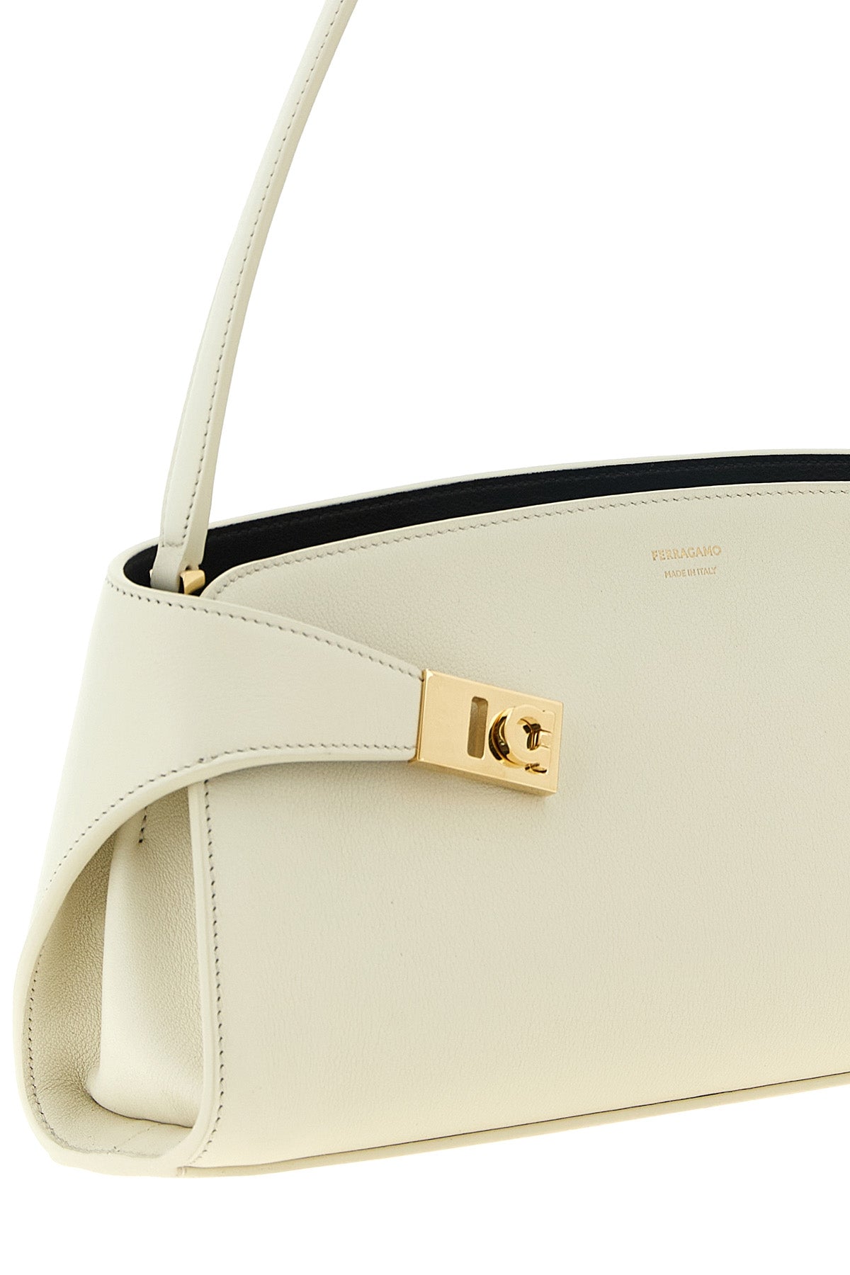 the ferragamo hug east-west shoulder bag in calf leather embodies sculptural e
