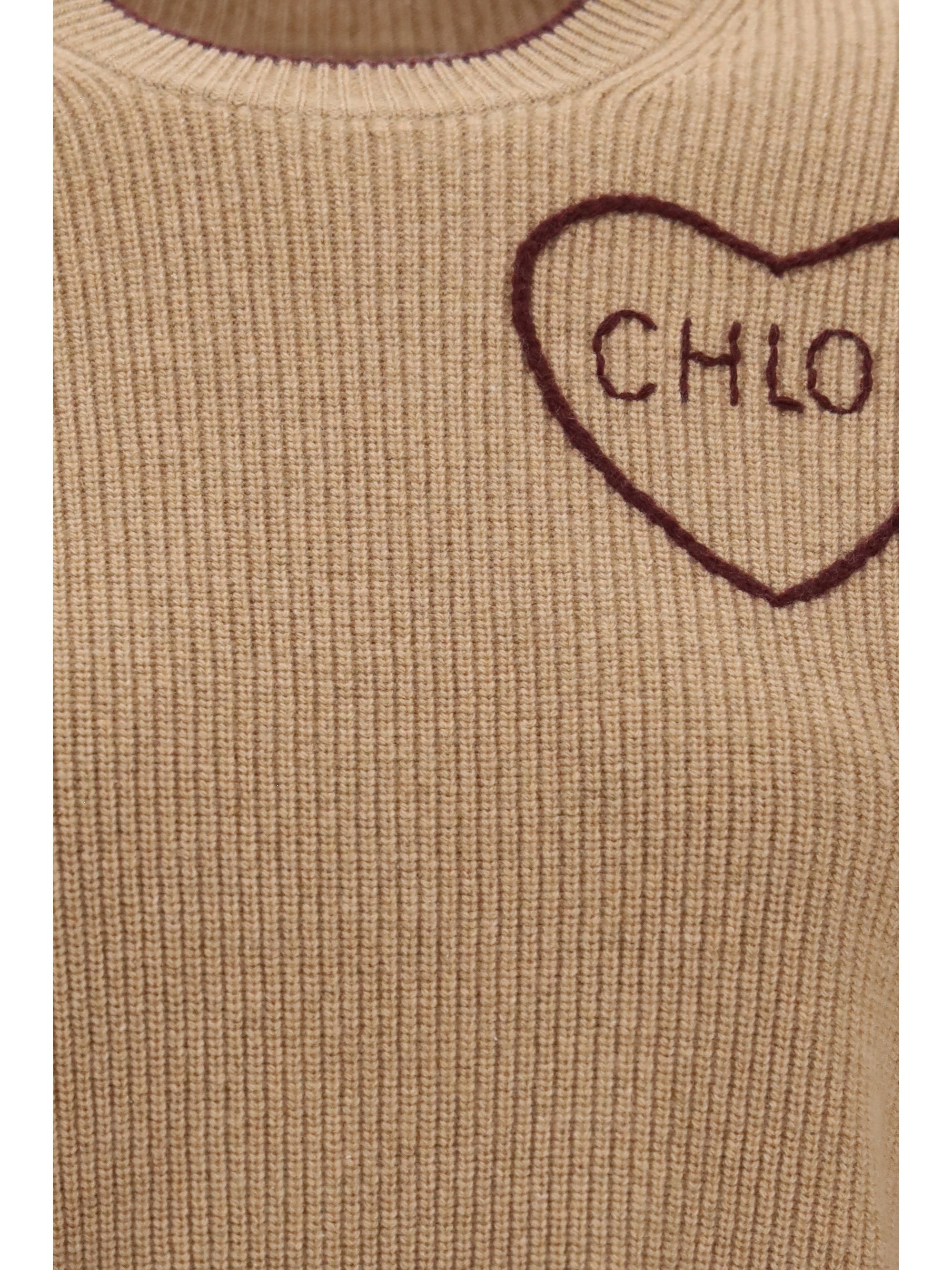 heart-logo sweater