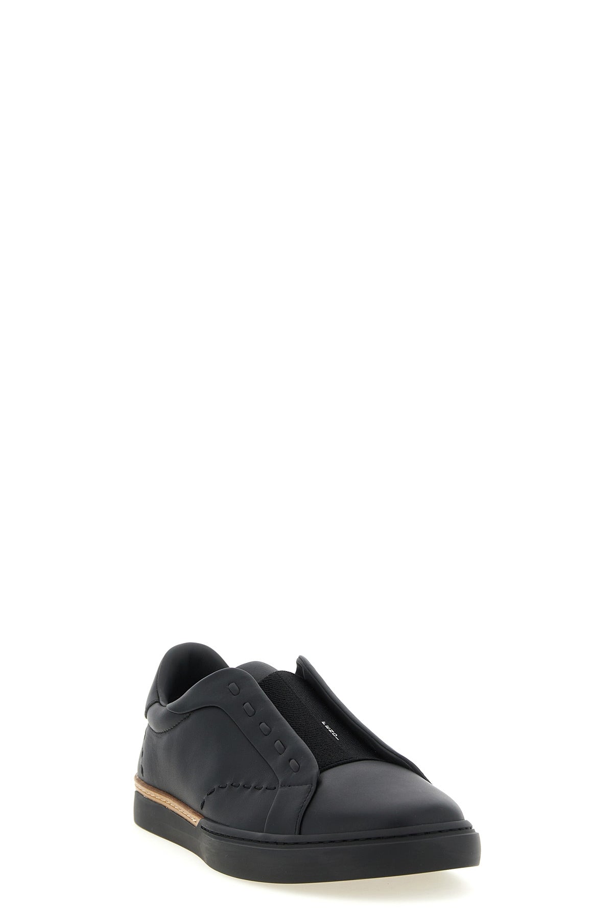 the fendi city slip-on sneakers anchor contemporary footwear to a deep artisan
