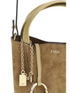 suede spin handbag