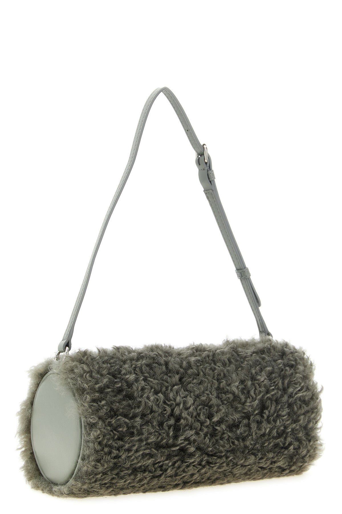 the stella mccartney clutch redefines everyday volumes through a geometric silho