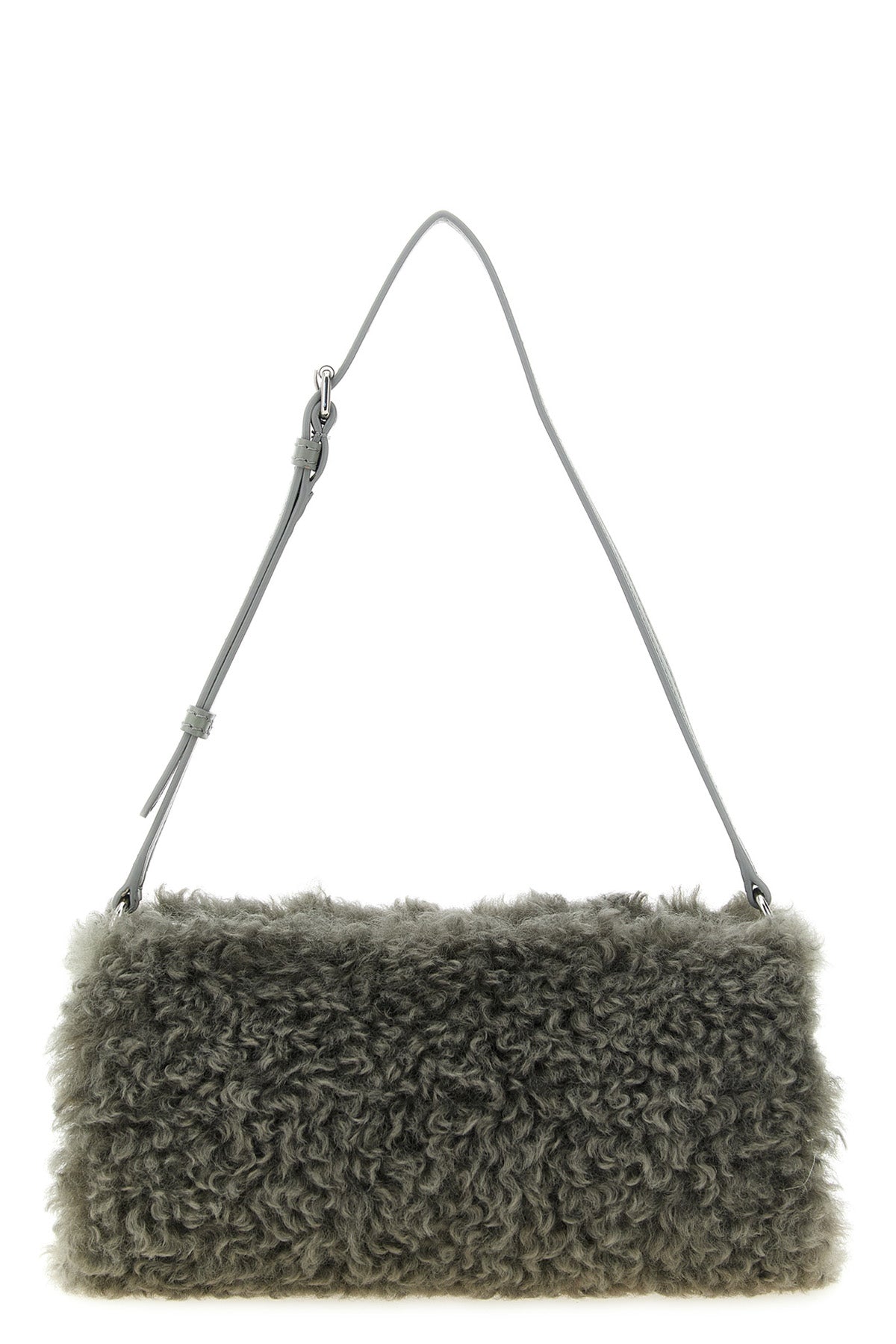 the stella mccartney clutch redefines everyday volumes through a geometric silho