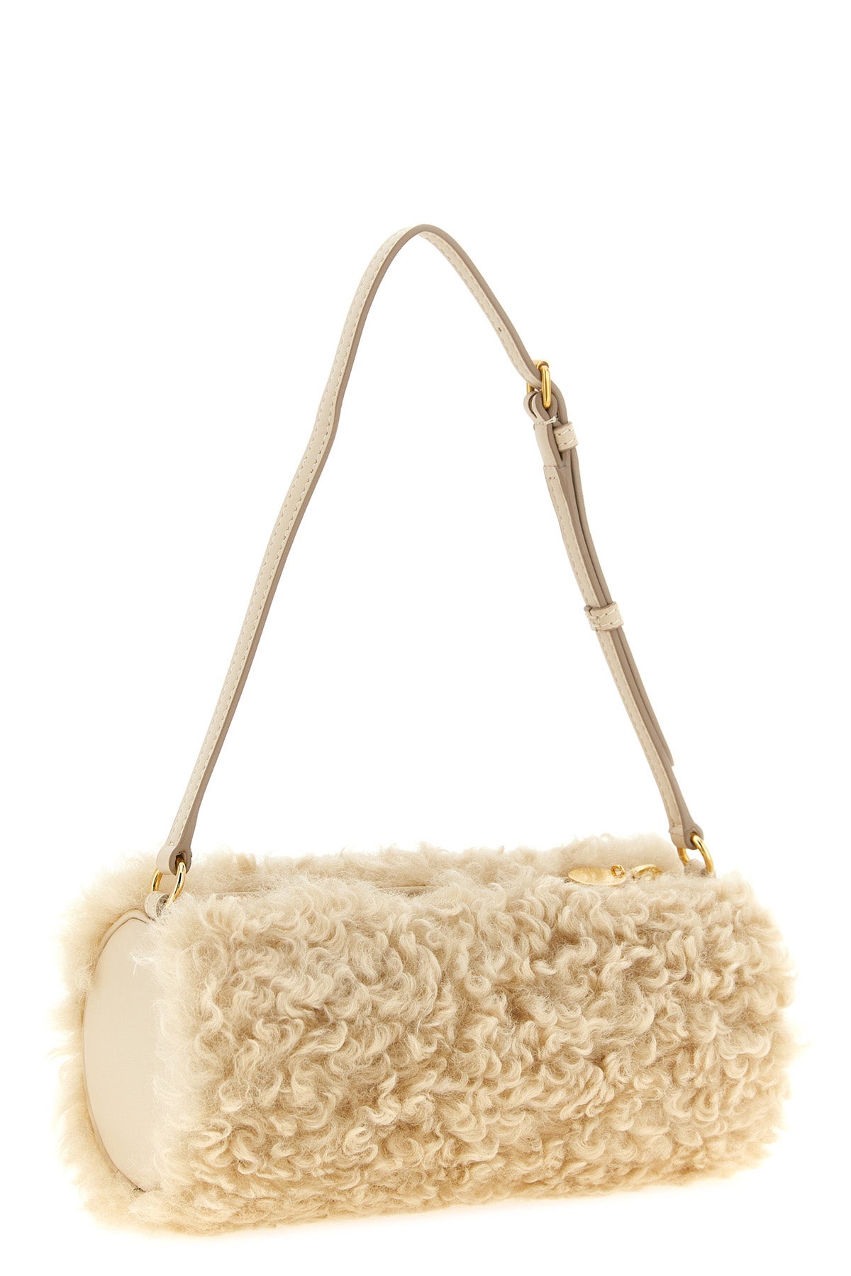 the stella mccartney clutch redefines everyday volumes through a structured cyli