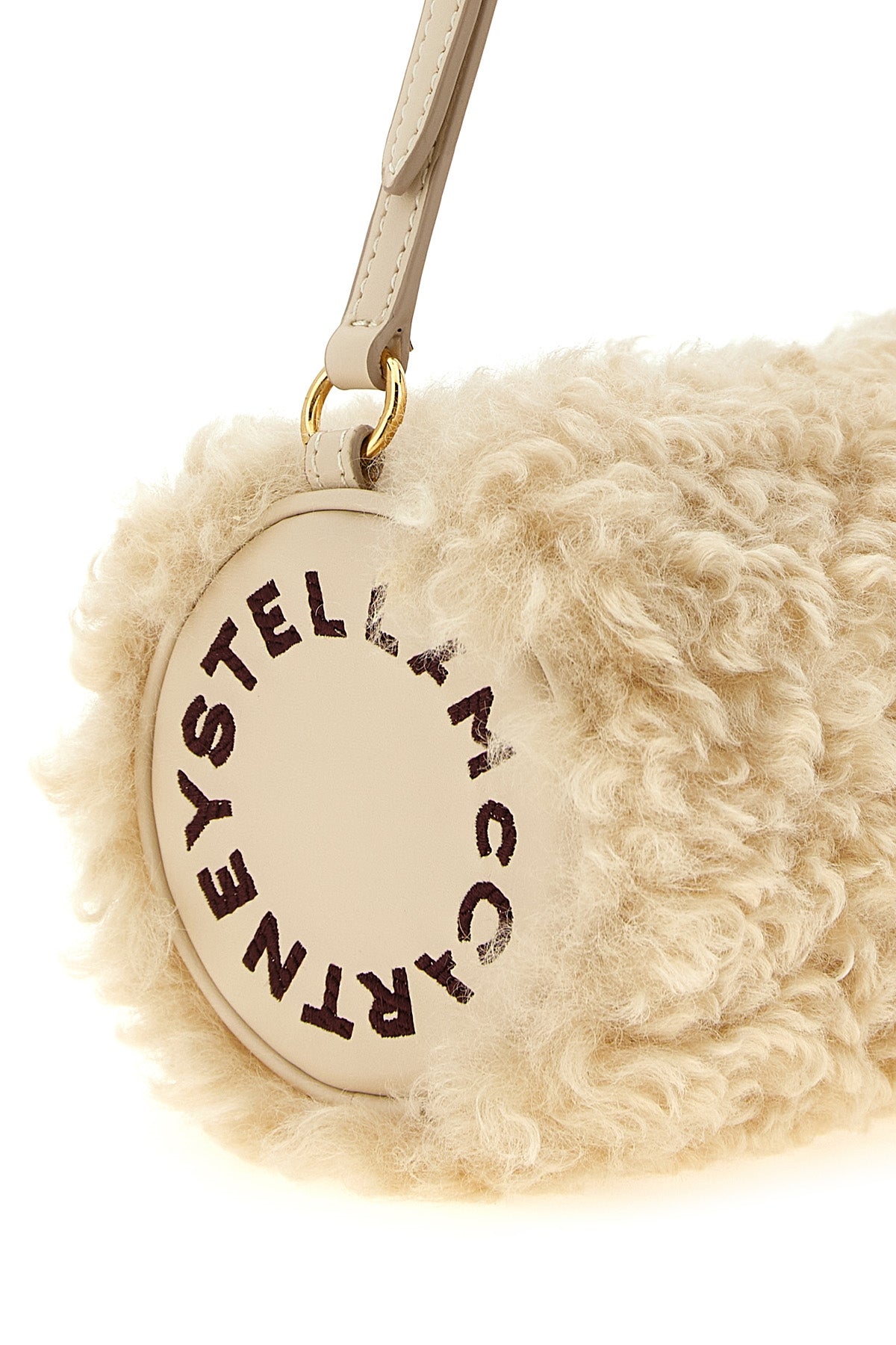 the stella mccartney clutch redefines everyday volumes through a structured cyli