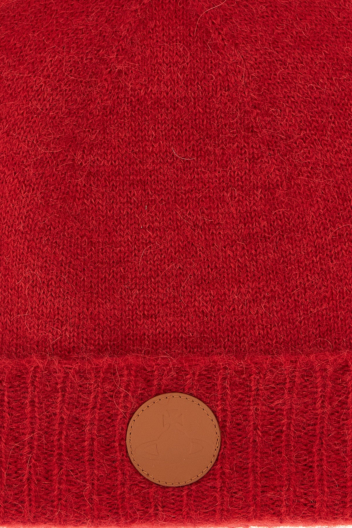 the vivienne westwood cap redefines winter accessories through a rich and envelo