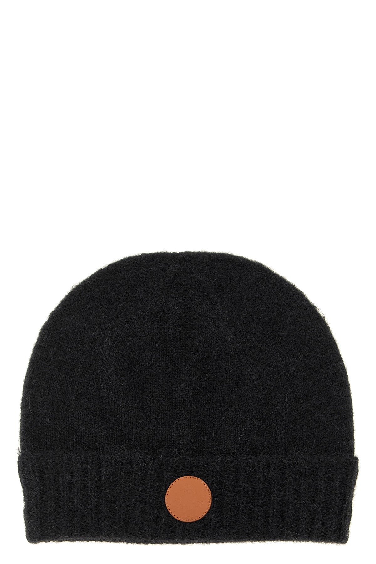 the vivienne westwood cap defines winter aesthetics through enveloping volumes a