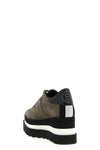 stella mccartney sneak-elyse sneakers redefine the volumes of contemporary foo