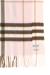 the burberry scarf redefines accessory codes through an enveloping silhouette an