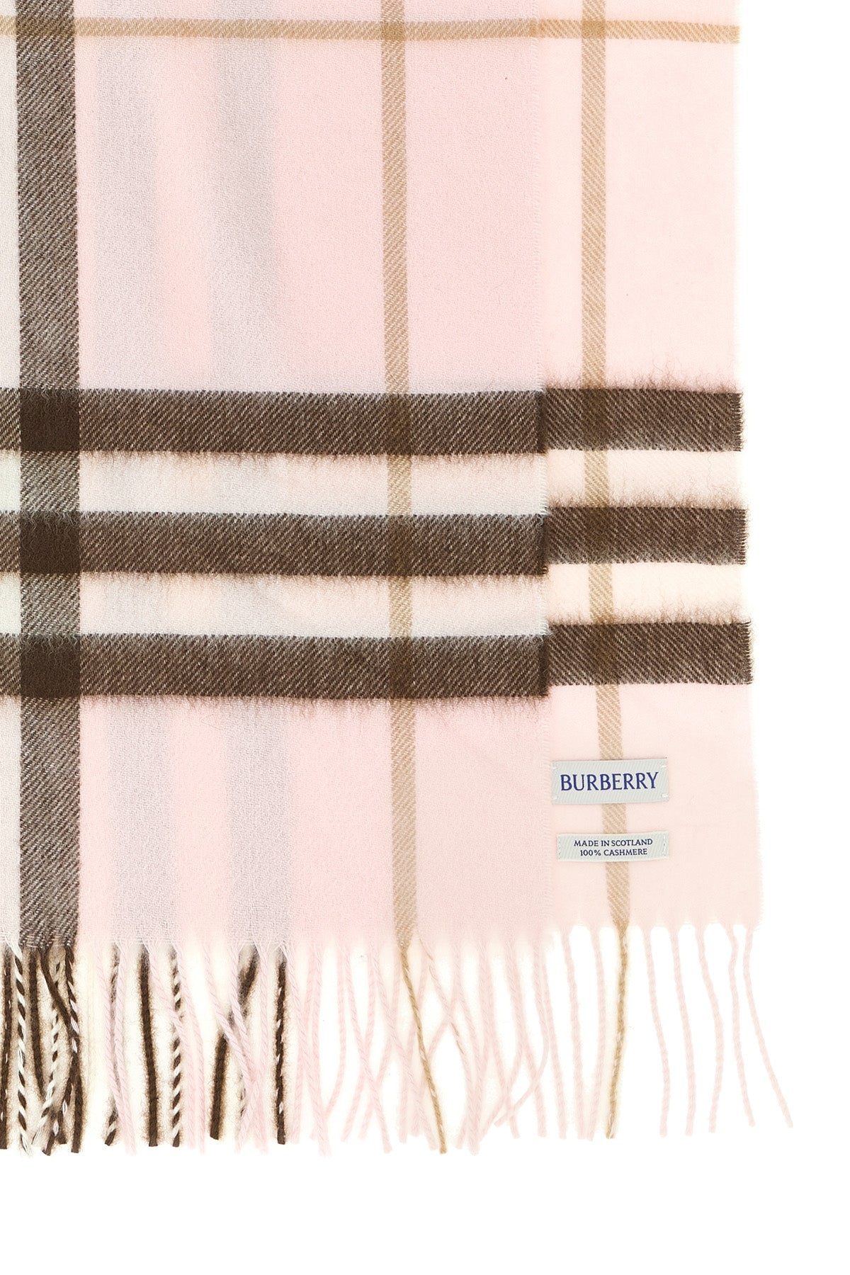 the burberry scarf redefines accessory codes through an enveloping silhouette an