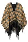 the burberry cape exemplifies a masterful outerwear construction through its dou