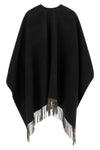 the burberry cape exemplifies a masterful outerwear construction through its dou