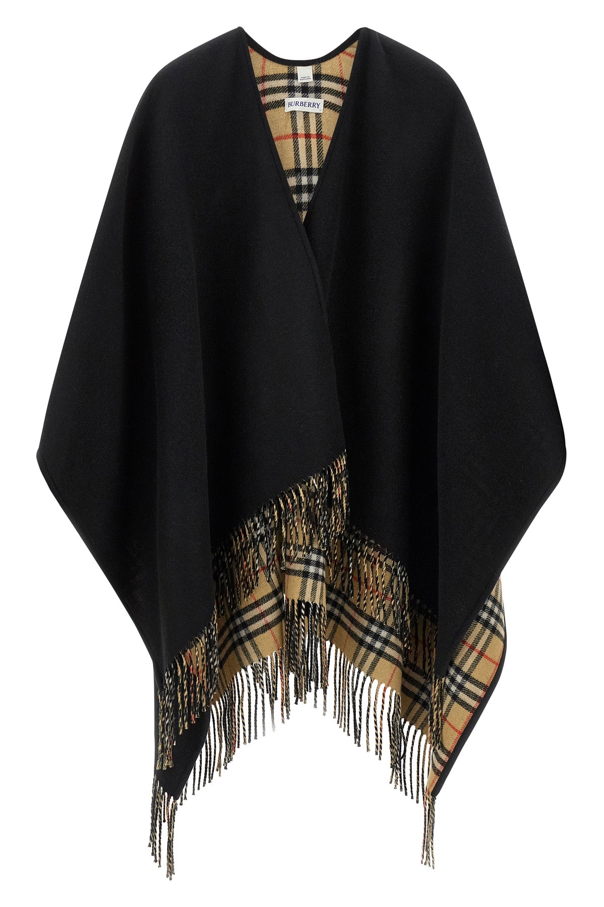the burberry cape exemplifies a masterful outerwear construction through its dou