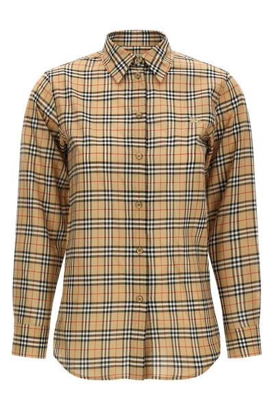 the burberry emma shirt redefines the codes of everyday elegance through metic