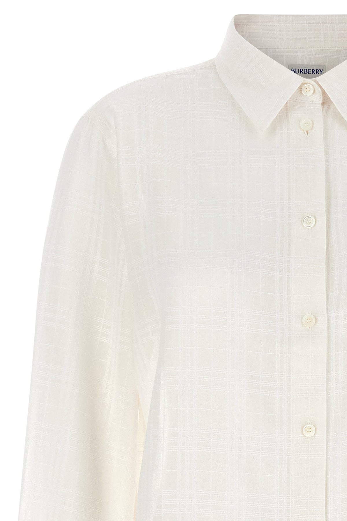 the burberry emma shirt redefines the codes of everyday elegance through metic