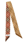 burberrys thin pure mulberry silk scarf is distinguished by an elongated silhou