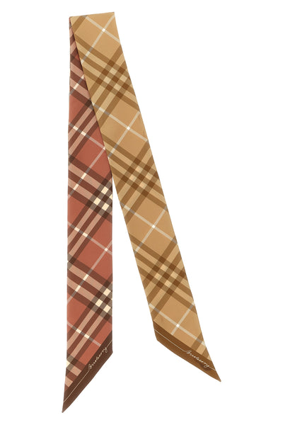 burberrys thin pure mulberry silk scarf is distinguished by an elongated silhou